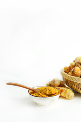 Fresh turmeric on white background,raw material for cooking. Close up.