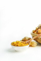 Fresh turmeric on white background,raw material for cooking. Close up.