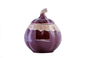 Dark brown earthenware pot with a pumpkin-shaped lid. Designer utensils for food, bulk products and seasonings.