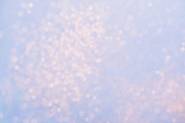 Festive Blue background of golden glitter lights. Winter blurred abstraction