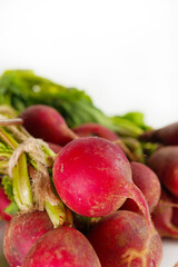 red radish on white background,raw material for cooking. Close up.