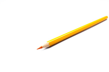 Side view of colored pencils. Orange. put on a white background Concept art, design, copy space, school and office