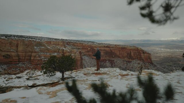 Taking Photos of the Beautiful Canyon covered in snowfall. Located at the Colorado National Monument near Grand junction.