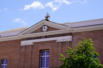 clock facade of Theatre building in perpignan city France