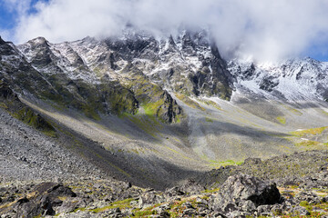 View of mountain peak covered with clouds