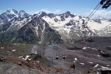 Beautiful snow-capped mountain peaks of the Caucasus Mountains next to the highest peak in Europe - Elbrus