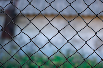 Metal mesh chain-link close-up. Background and texture.