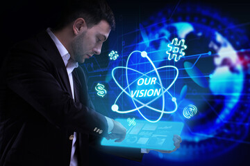 Business, Technology, Internet and network concept. Young businessman working on a virtual screen of the future and sees the inscription: Our vision