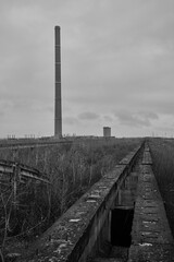 industrial landscape with a refinery, polluting industry. Industrial ruins.