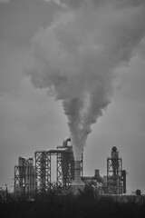 industrial landscape with a refinery, polluting industry. Industrial ruins.