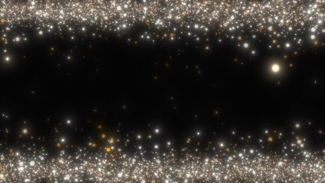 Lots of sparkling golden particles at the top and bottom of the frame create a vibrant Christmas overlay. Use this through blending modes in your holiday projects.