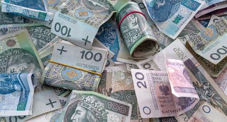 Zl as money of Poland, zloty pile of banknotes. different bills