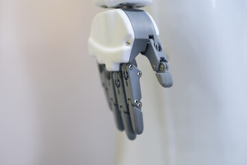 Robotic hand with fingers on a white background