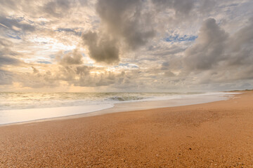 Atlantic coast beach in cloudy weather.
