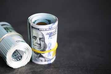 Group of money stack of 100 US dollars banknotes a lot of the background texture. Cash money in a large pile as a finance background.