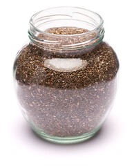 glass can full of organic natural chia seeds close-up isolated on white background