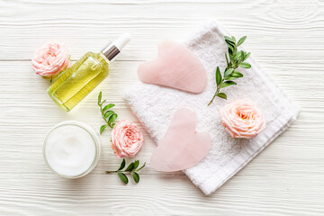 Cosmetics products with gua sha face massage stone and roller