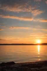 Fototapeta na wymiar beautiful sunset scenery above the lake in south west of france, les landes