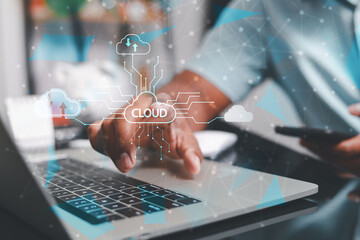Businessmen use laptops to secure computing through cloud storage for digital business and cloud data processing management. Optimizing online business customer service 