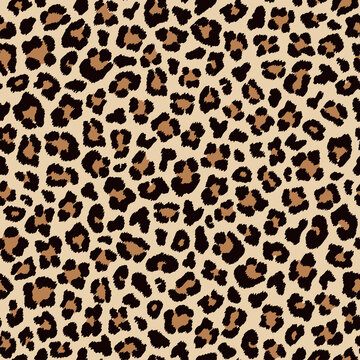 Leopard seamless pattern, beige brown spotty fur. Vector