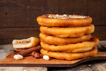 Traditional south korean sweet street food hotteok on wooden background.