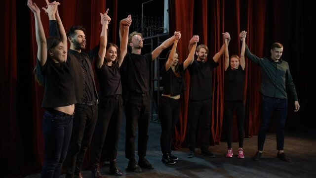 Group of young artists is together on the theater stage have rehearsal