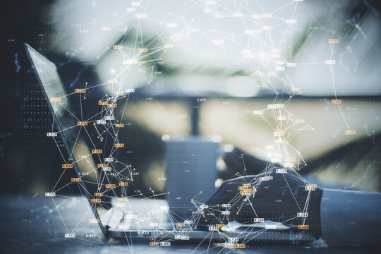 Close up of businessman hand using laptop at desktop with coffee cup and creative glowing big data connections circle on blurry background. Science, digital network and technology concept.