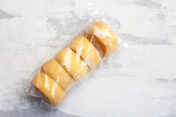 five small cheeses in small plastic bag