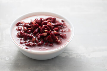 boiled red beans in small white bowl