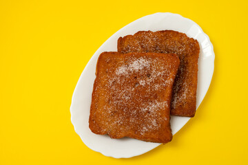 typical portuguese Christmas dessert fried bread with cinnamon