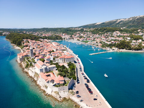 Croatia, Primorje-Gorski Kotar County, Rab, Drone view of coastal town in summer