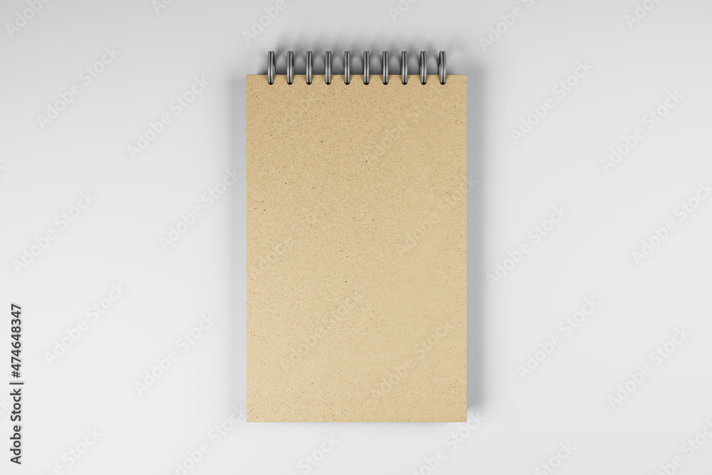 Poster Top view and close up of brown spring notepad on white desktop background. Mock up place for your advertisement. Education, work, supplies and stationery concept. 3D Rendering.