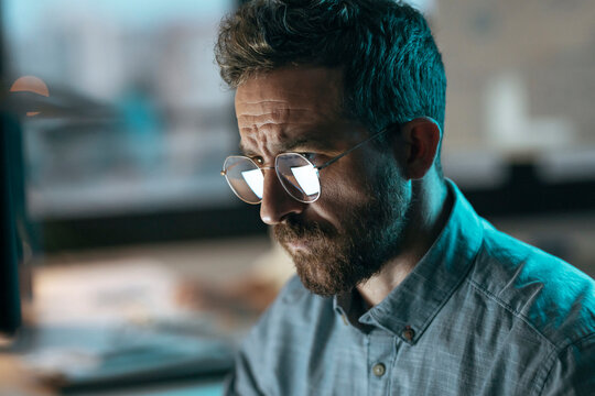 Businessman wearing eyeglasses working in office