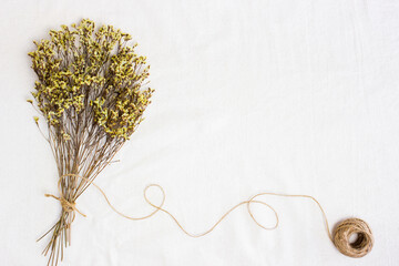 A bunch of flowers with rope with copy space.