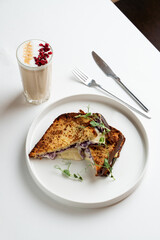 Classic grilled cheese sandwich with a cup of coffee, laconic minimalist photo for a menu