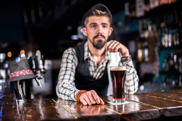 Barman creates a cocktail on the saloon