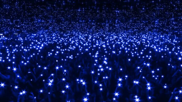 Lights in the stadium. Animation imitation of masses of people with flashlights in their hands at the show. Concert flash mob. Array of light phones. Loop.