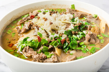 A pot of water-boiled meat slices