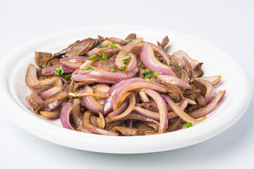 A dish of sauce on a white background explodes the pig liver