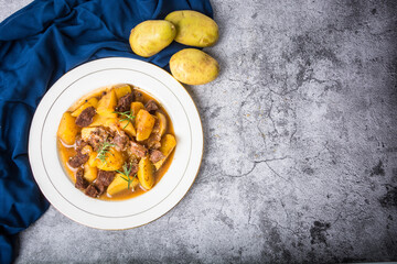 A pot of braised potato beef brisket