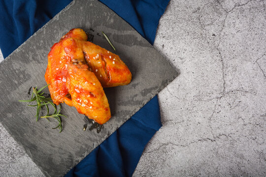 A plate of Orleans grilled chicken wings