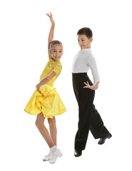 Obraz premium Beautifully dressed couple of kids dancing on white background