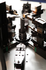 CNC spring making machine.  Industrial machine.