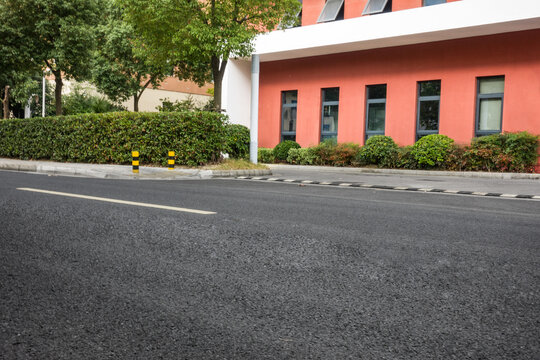 empty brick floor with modern building in background