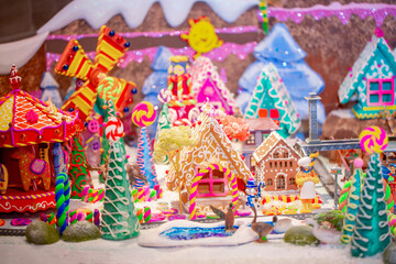 Christmas decorations in the interior. Festive background. New Year's room design, beautiful and shiny toys on the Christmas tree. Blurred background with copy space for text.