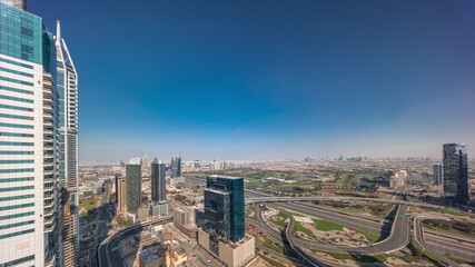 Aerial panorama of media city and al barsha heights district area timelapse from Dubai marina.
