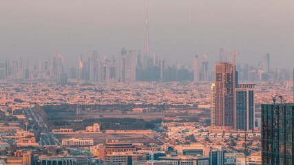 Dubai Downtown skyline row of skyscrapers with tallset tower aerial timelapse. UAE