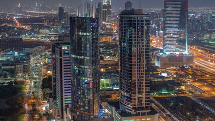 Fototapeta na wymiar Aerial view of media city and internet city night timelapse from Dubai marina.