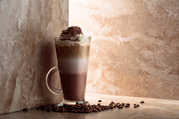 Milk coffee cocktail with whipped cream.