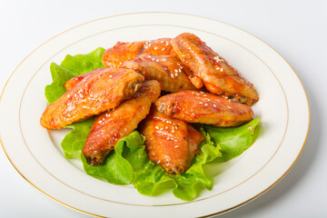 A plate of Orleans grilled chicken wings